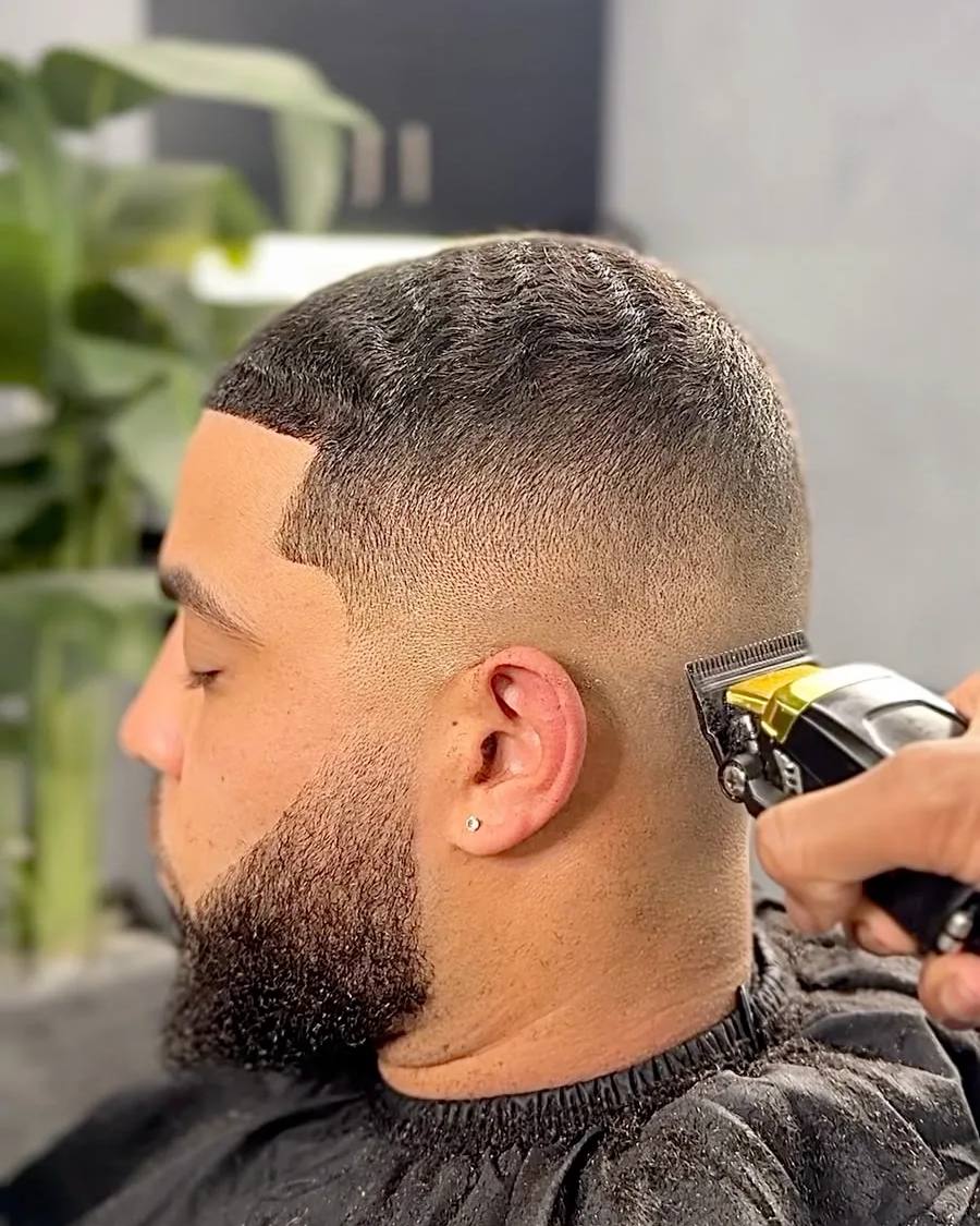 Skin fade with a clean nape line at Chair and Blade