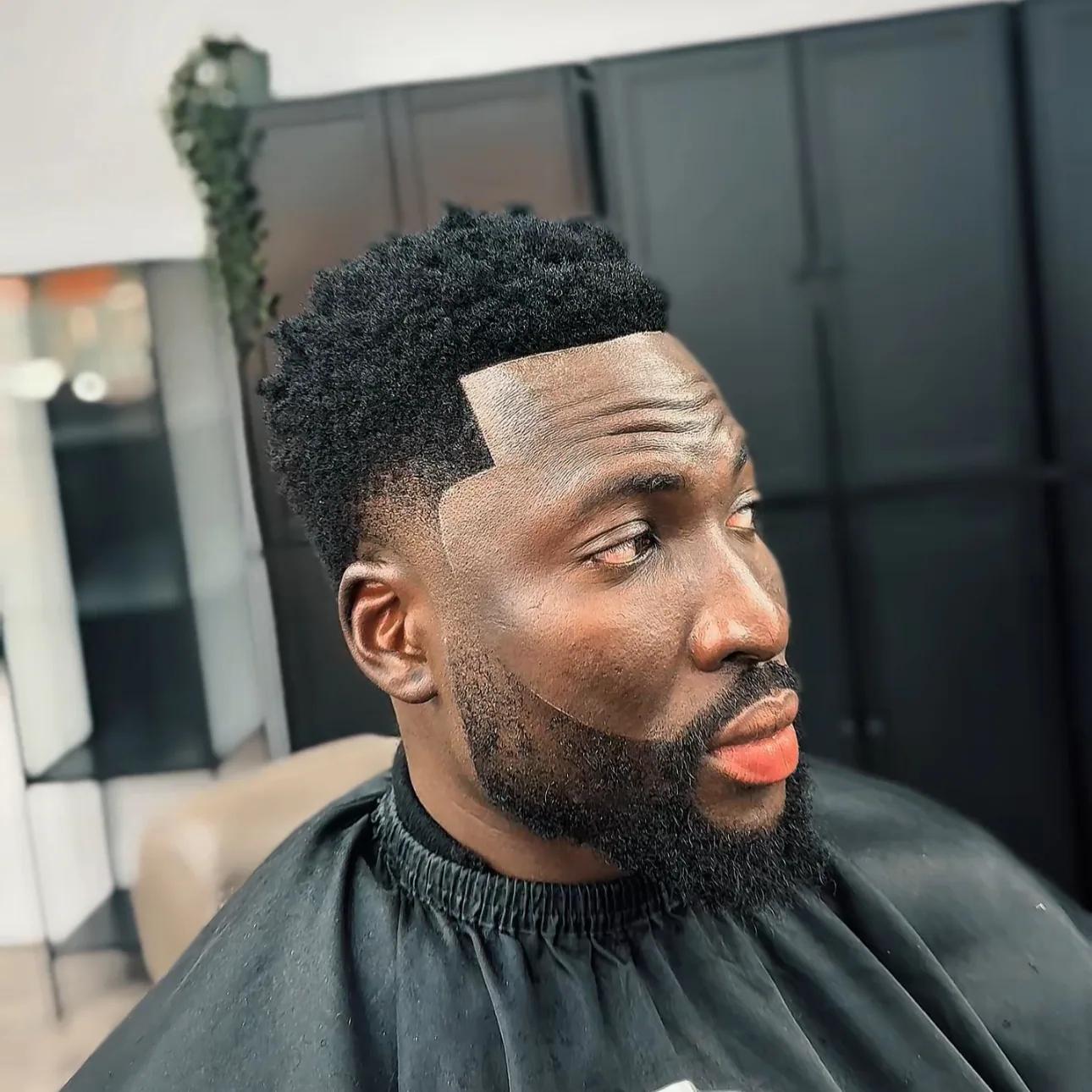 High top fade with a full beard, earlier work by Emmanuel (EA Blades)