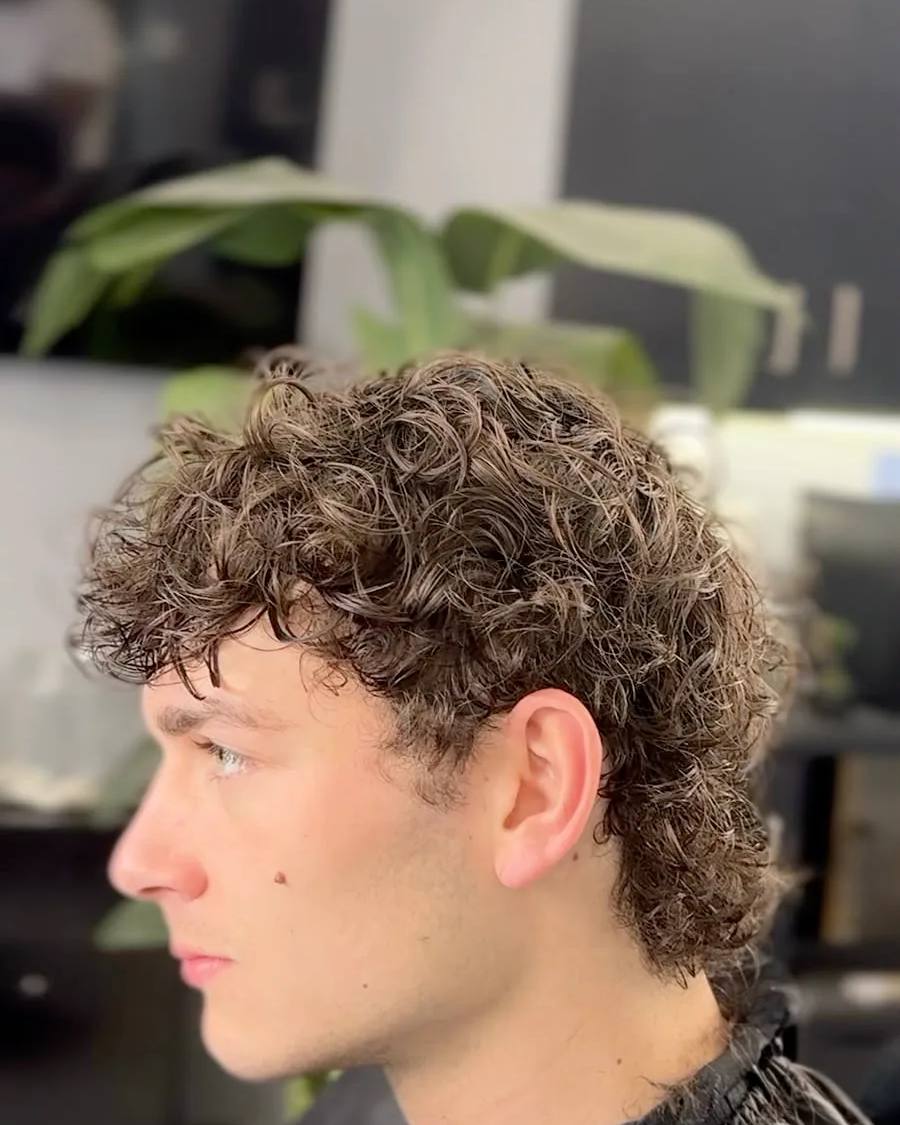 Curly layered perm at Chair and Blade