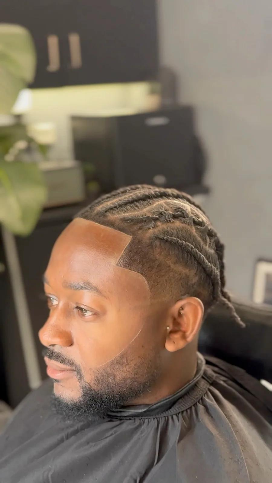 Sharp side part with a low fade, Chair and Blade Manchester