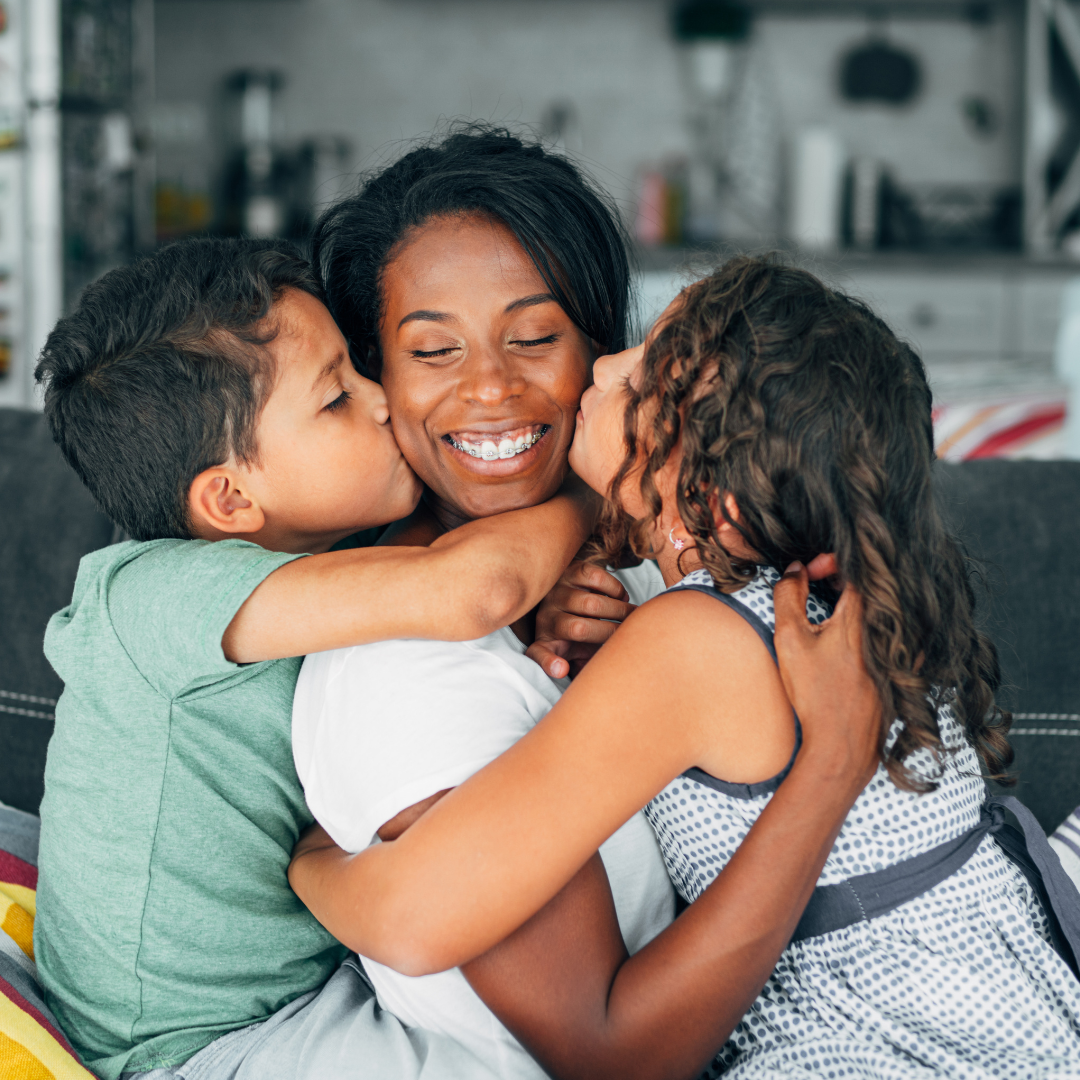 family hugging in recognition