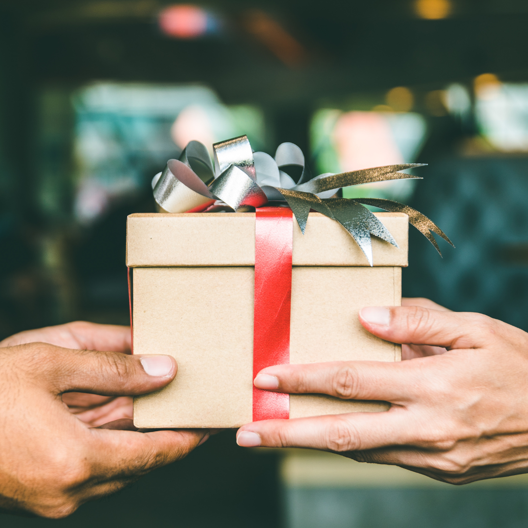 handing over a gift