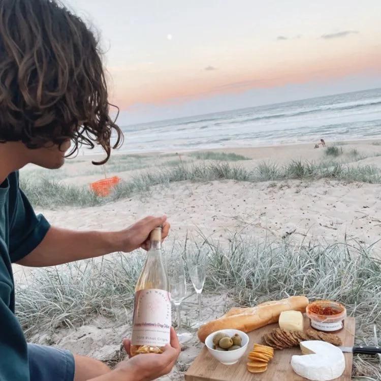 Friends celebrating birthday with personalised bottle