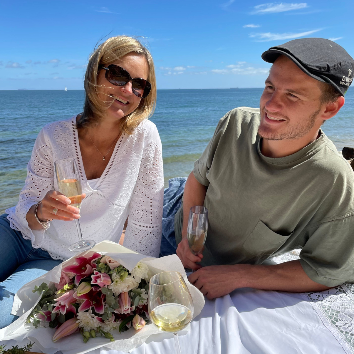 Friends celebrating birthday with personalised bottle