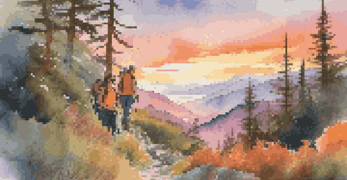 A couple smiling while hiking on a mountain trail at sunset, with colorful skies and greenery around them.