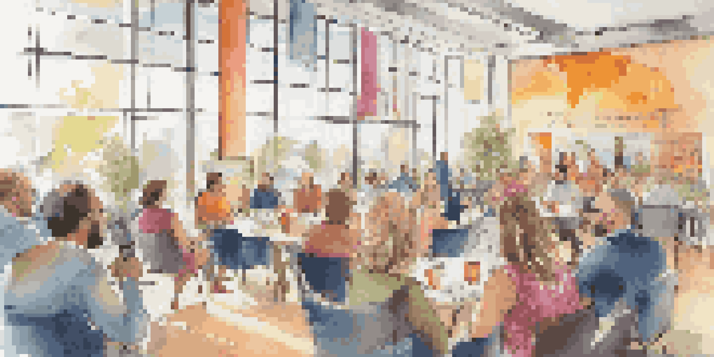 A lively travel blogging conference with attendees networking and engaging in discussions in a bright and colorful setting.