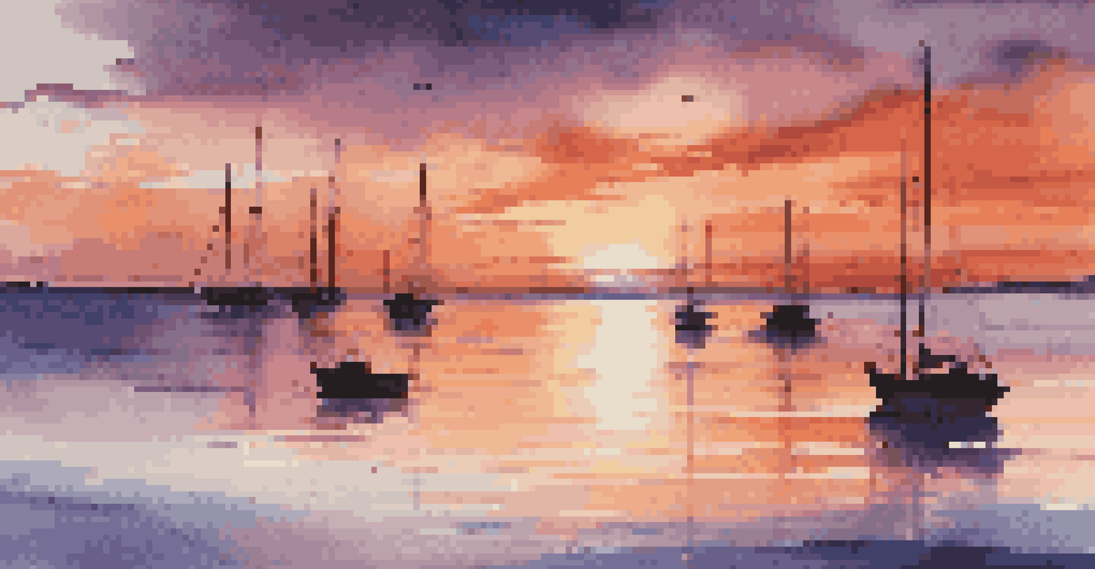 A colorful sunset over the ocean with silhouettes of sailboats.