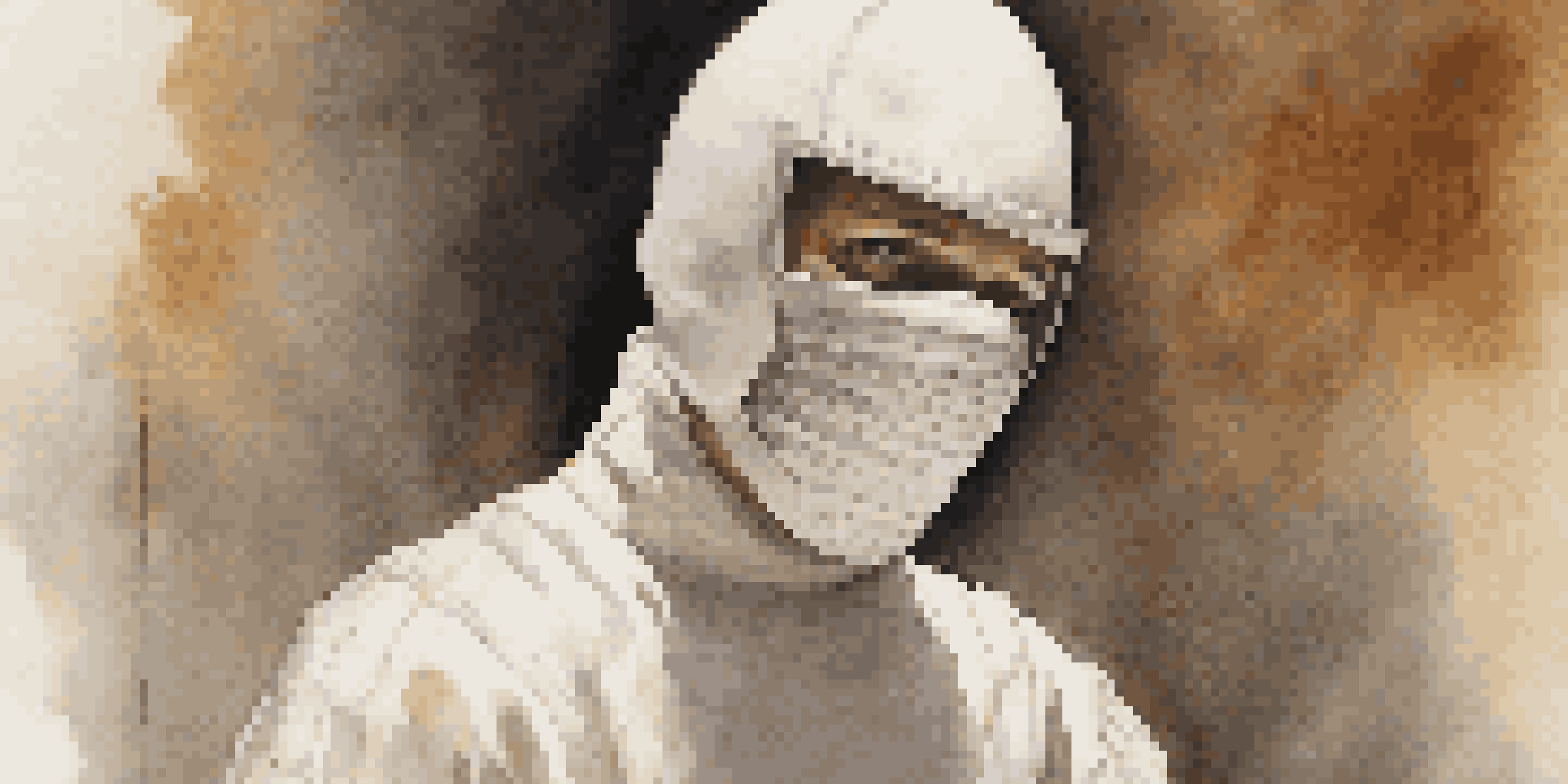 A fencer in a poised en garde position, wearing traditional fencing gear with a mask lifted, showcasing determination and focus.