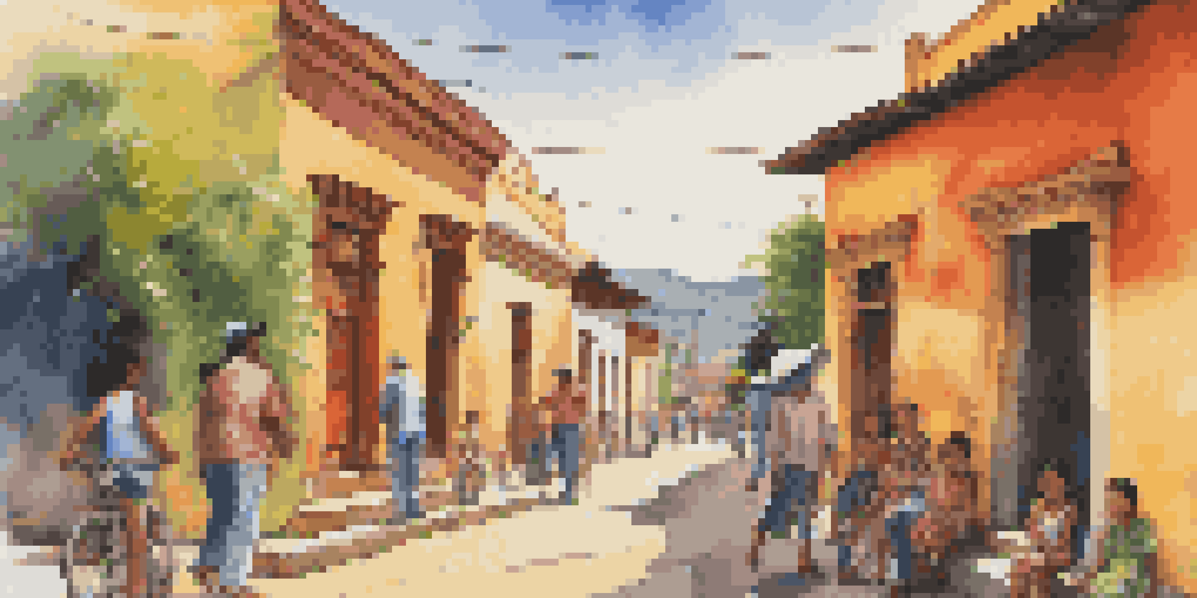 A colorful street in Oaxaca, Mexico, with murals depicting community stories and local people interacting under a bright, sunny sky.