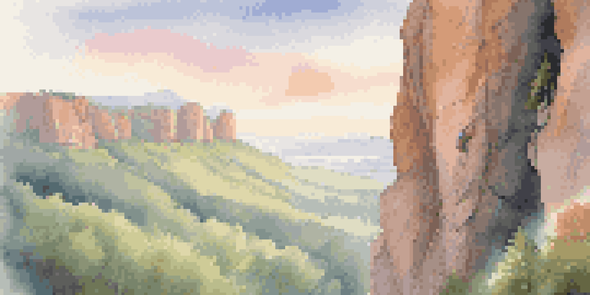 A climber climbing a granite cliff at dawn with soft morning light and a misty valley below.