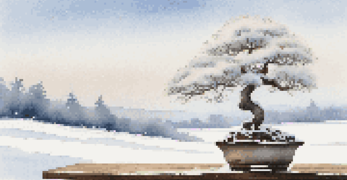 A small bonsai tree covered in snow, placed on a wooden table against a serene winter landscape with a pale blue sky.