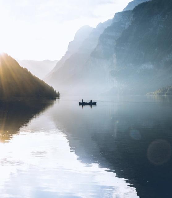 A Boat on the Turquoise Waters of Switzerland