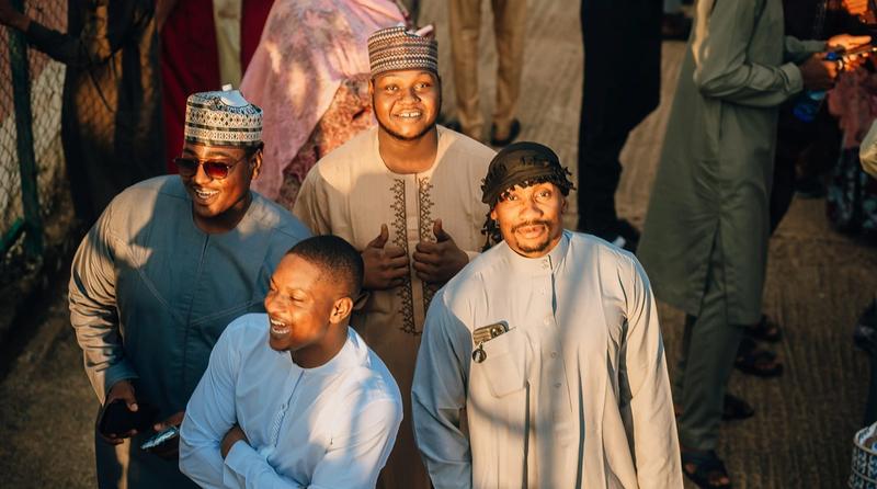 A group of traders smiling together