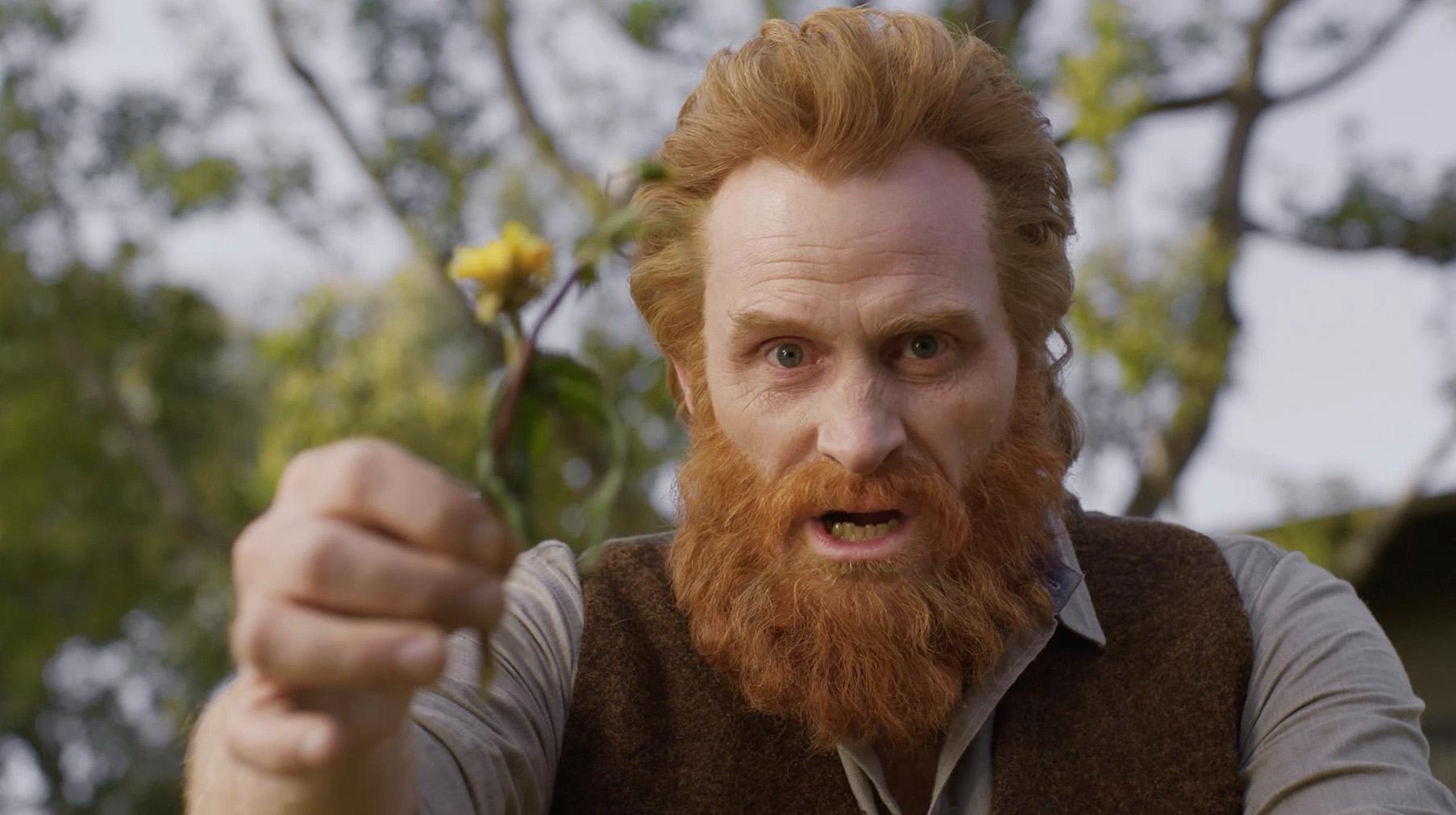 Scott holding a weed