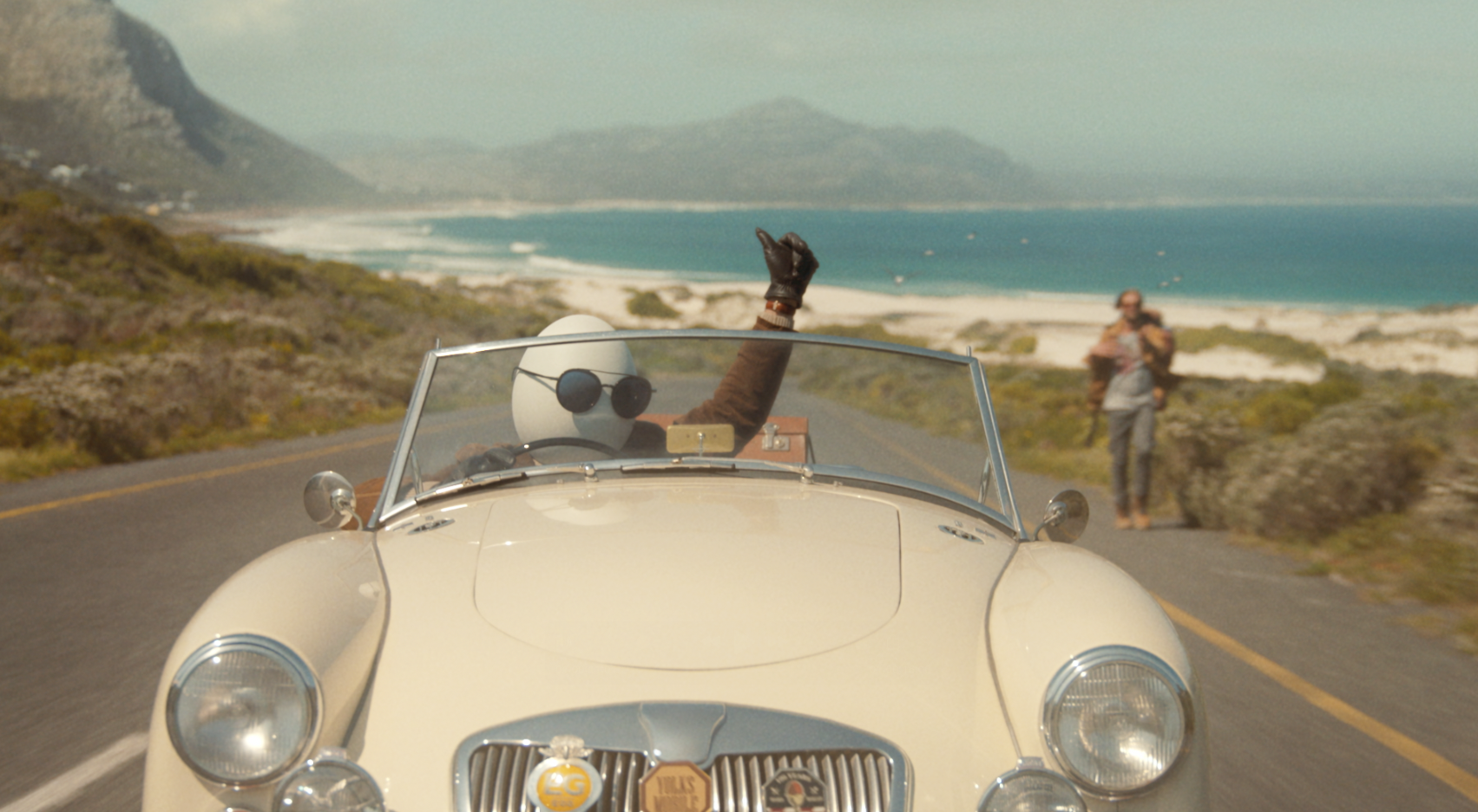 Hampton Dumpty driving with the top down