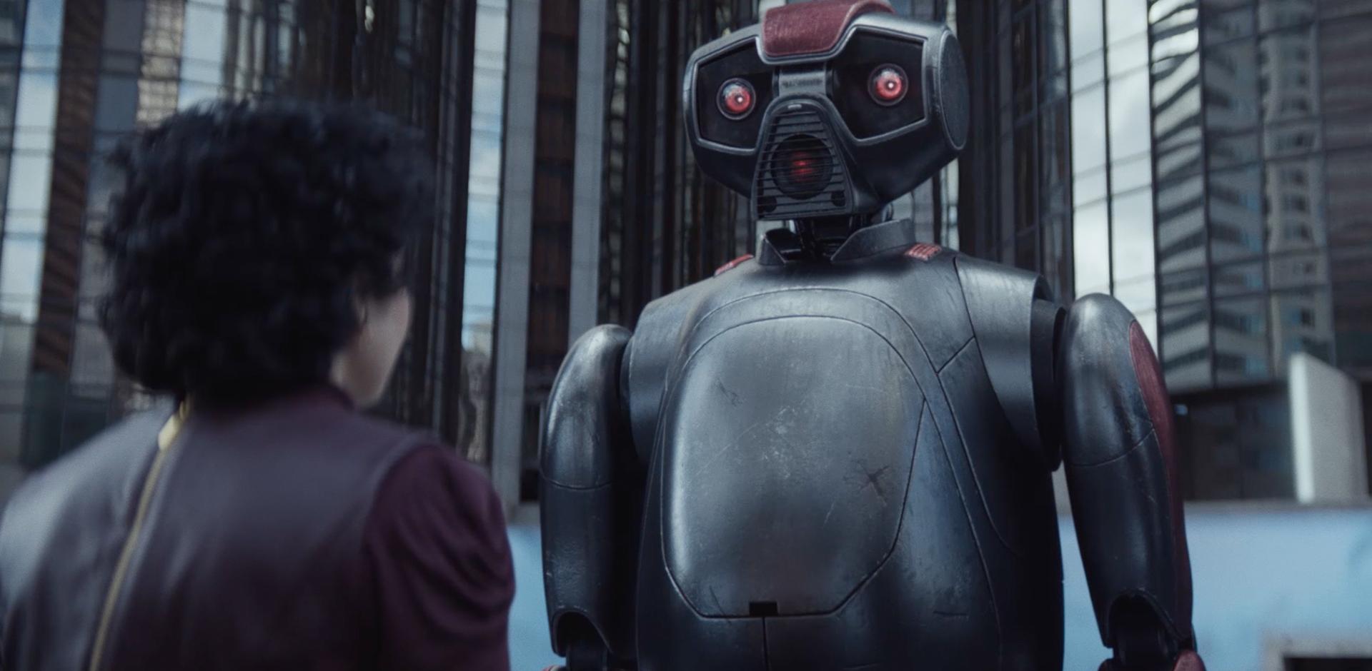 Robot standing in front of human