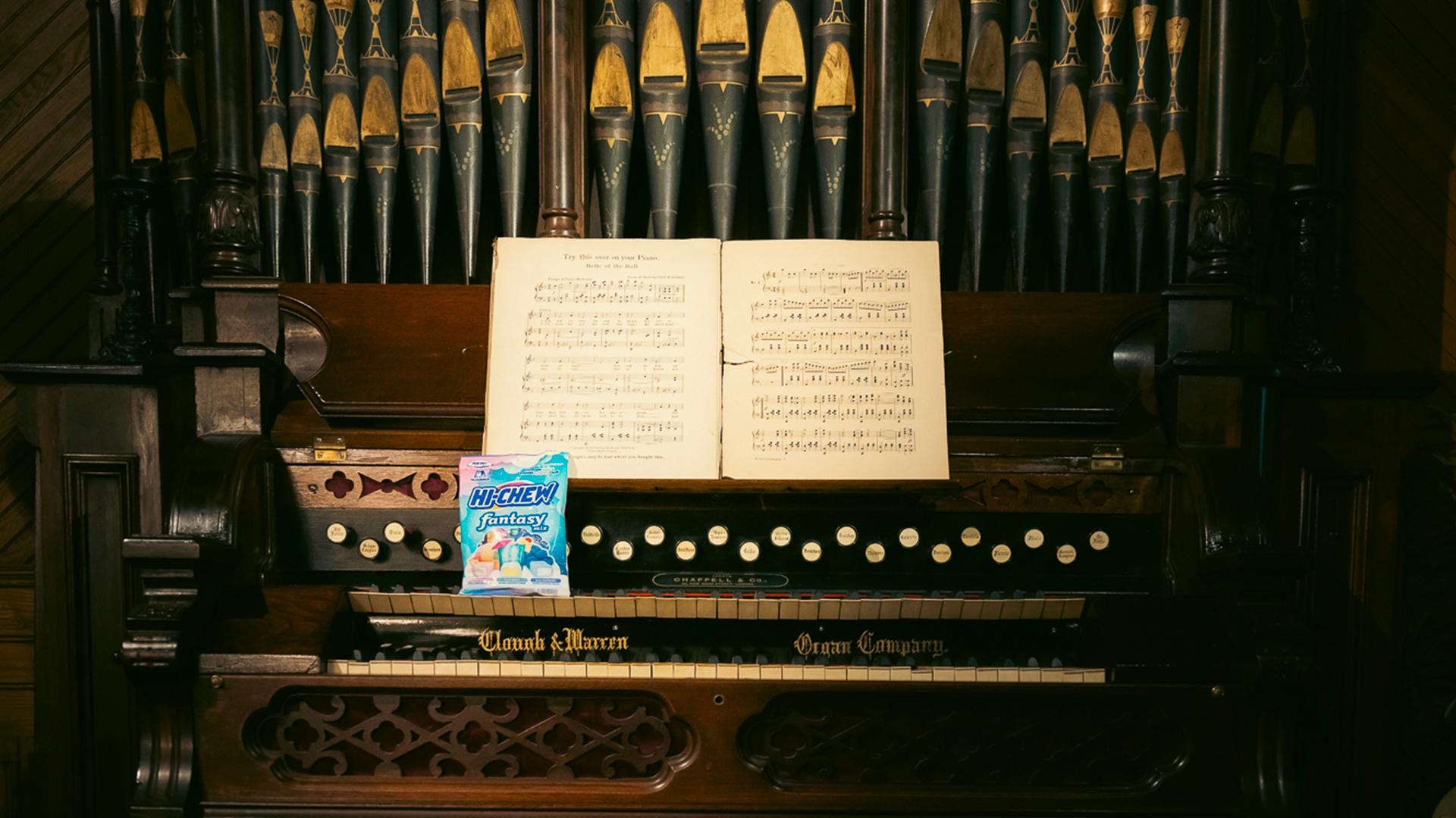 bag of HI-CHEW on a piano