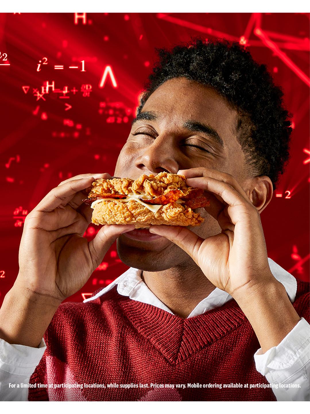 guy biting into double down sandwich