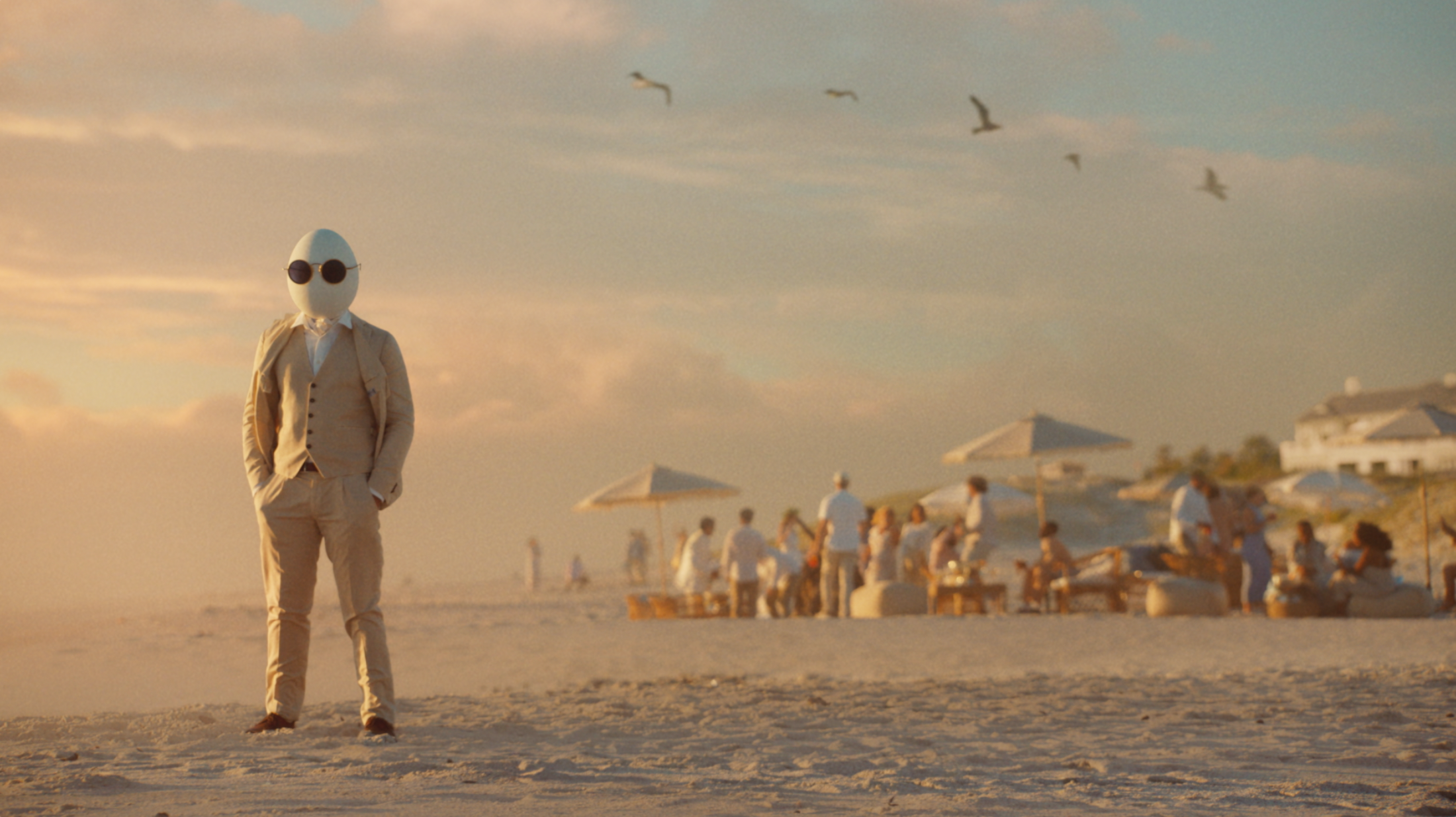 Hampton Dumpty in a suit on the beach