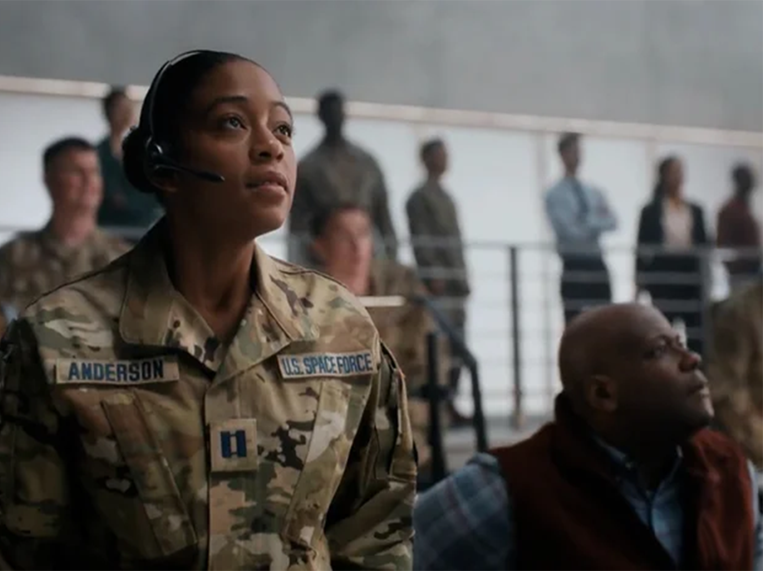 Woman in military next to father