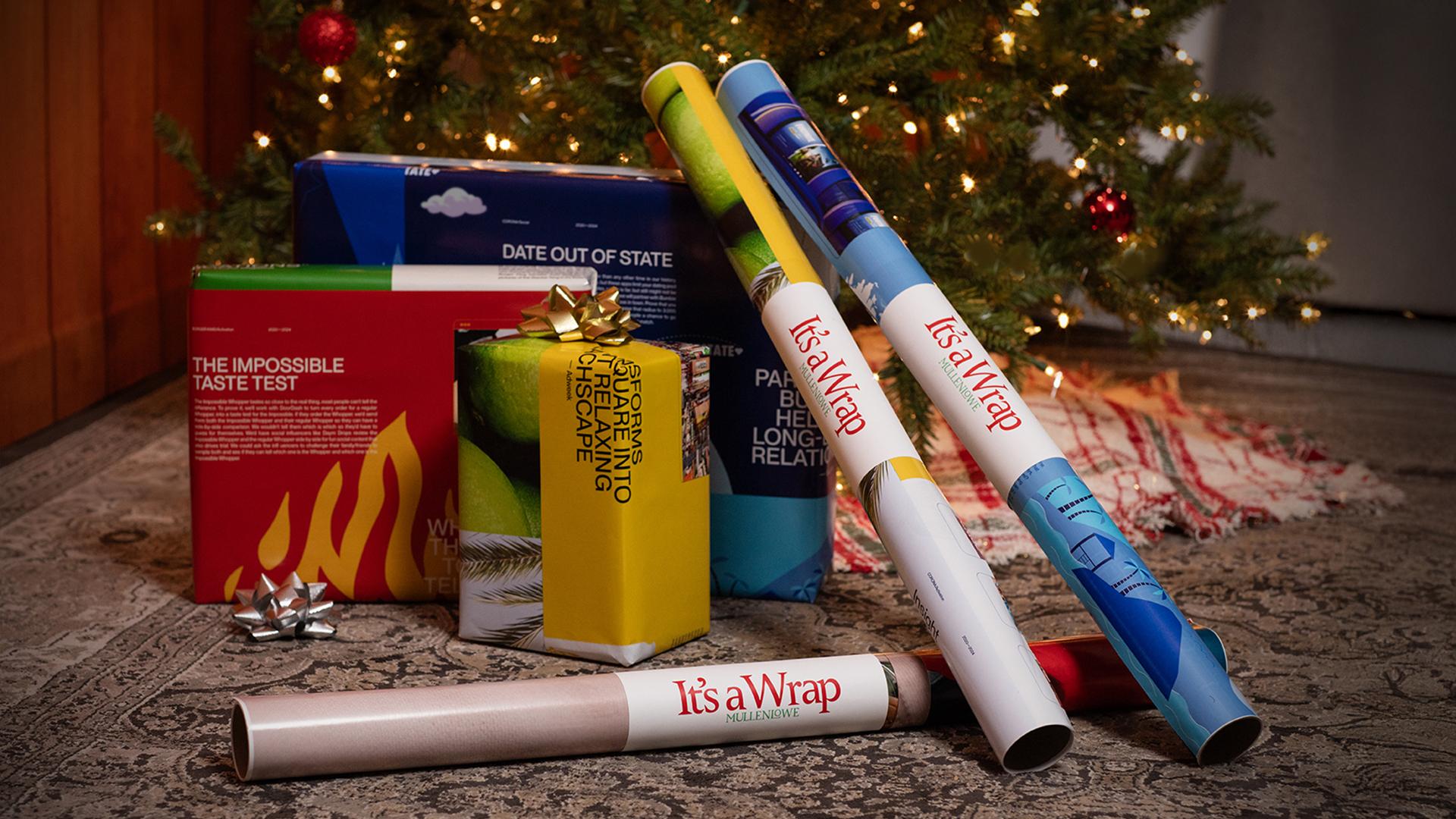 It's A Wrap wrapping paper under a Christmas tree