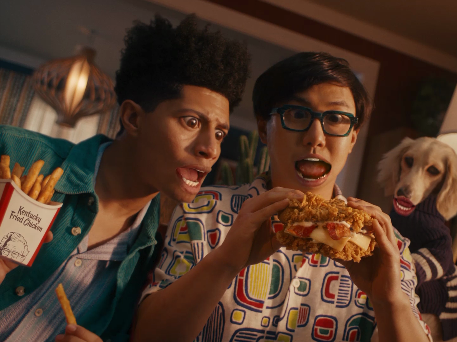 Two men with bulging eyes looking at double down sandwich