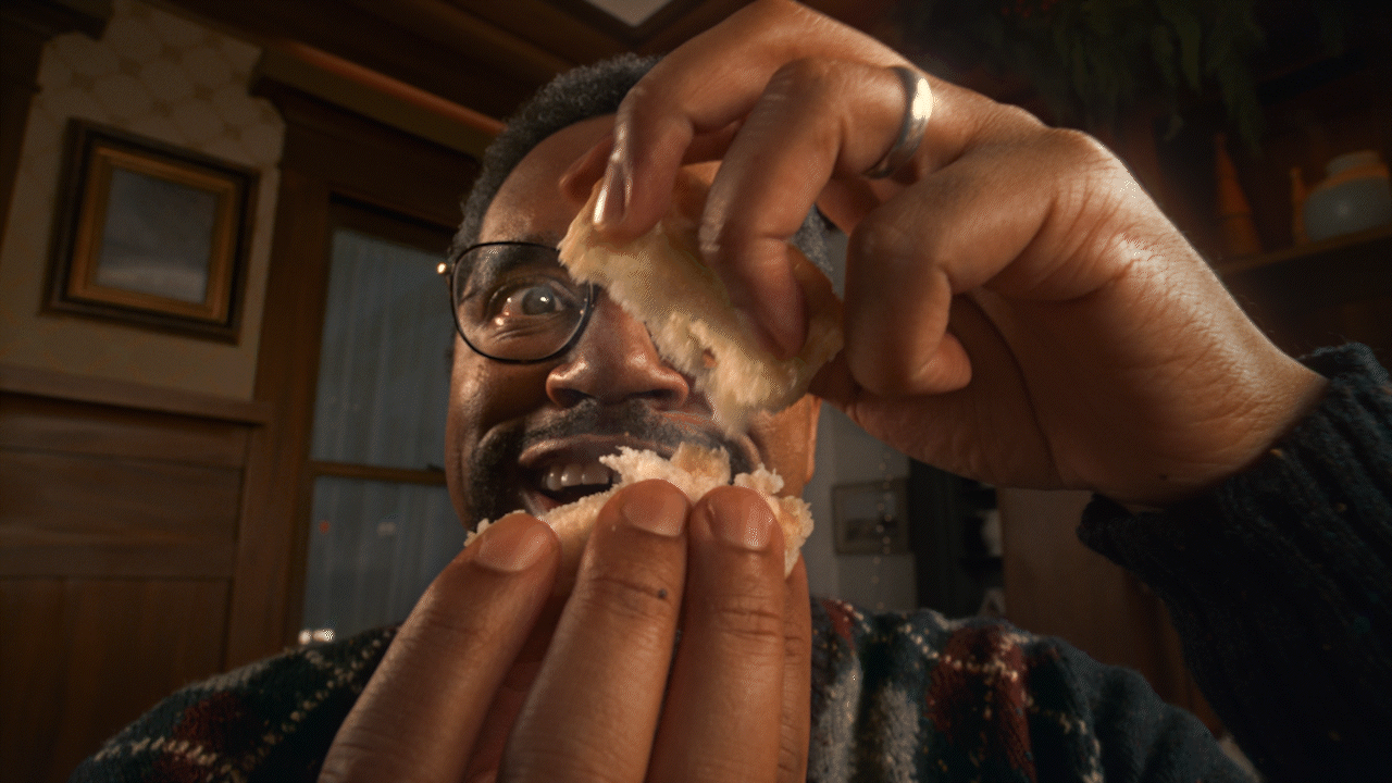 Man eating biscuit GIF