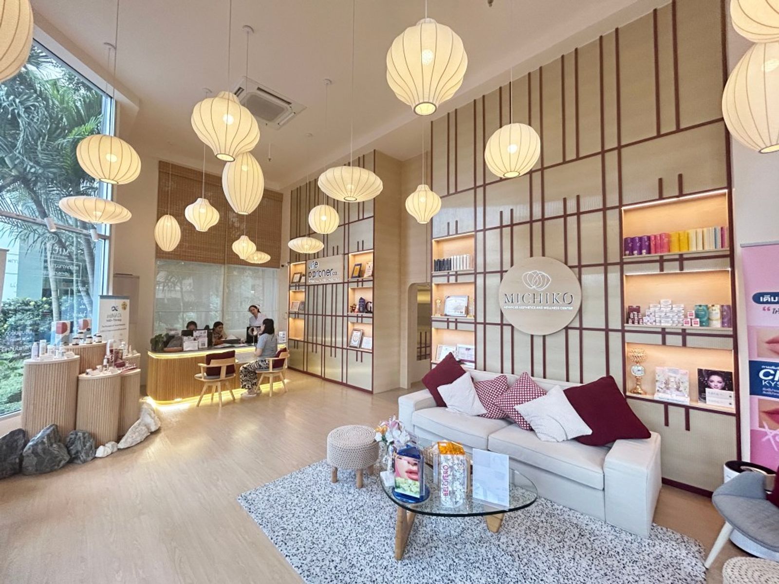 Seating, lanterns and display shelves inside MICHIKO Clinic Phahonyothin 21