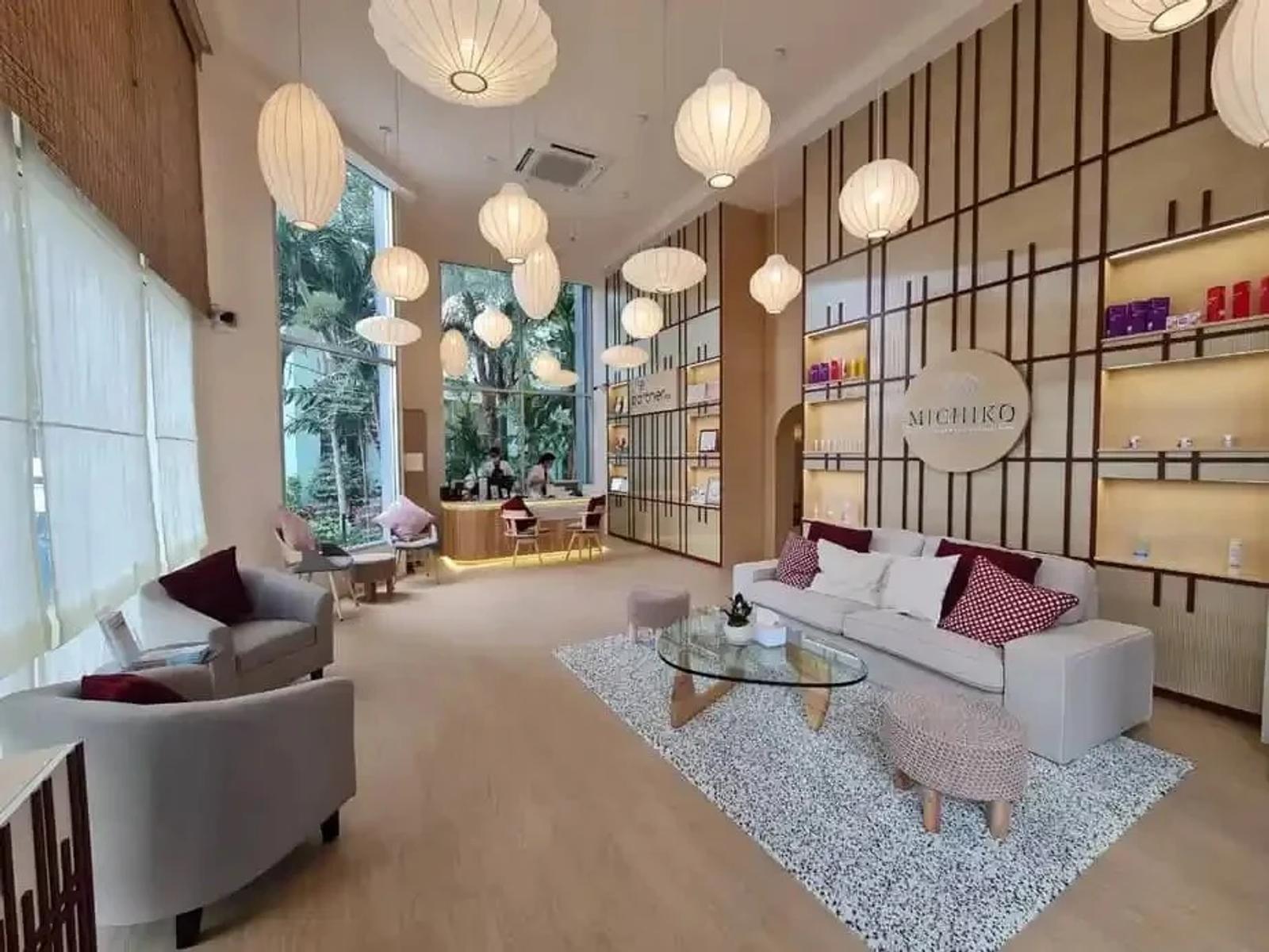 Warm wood interiors and a seating area at MICHIKO Clinic Phahonyothin 21