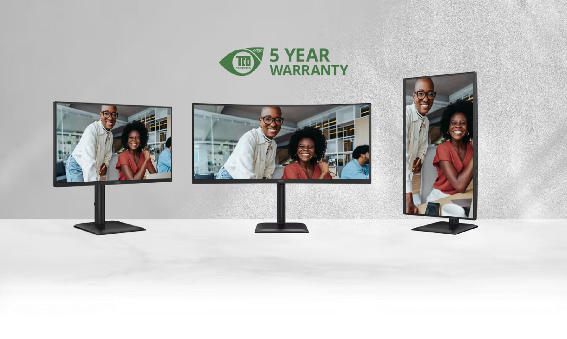 AOC business monitors in multiple sizes and orientations, including landscape and portrait modes, featuring TCO Certified Edge certification and a 5-year warranty.