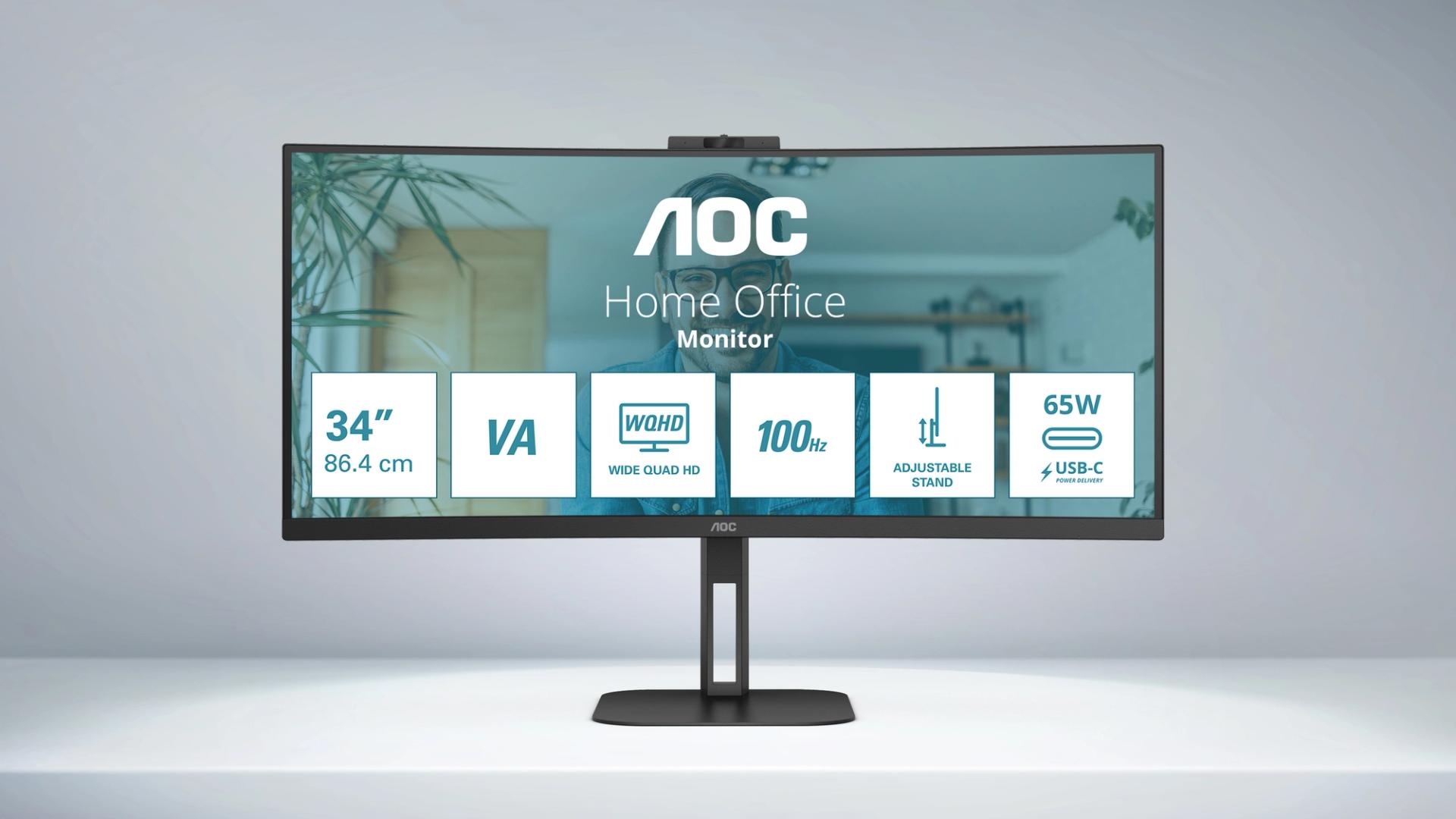 Monitor curvo AOC CU34V5CW de 34 pulgadas en un entorno de teletrabajo, mostrando varias aplicaciones abiertas, con cámara integrada y conexión USB-C para una configuración de escritorio simplificada.