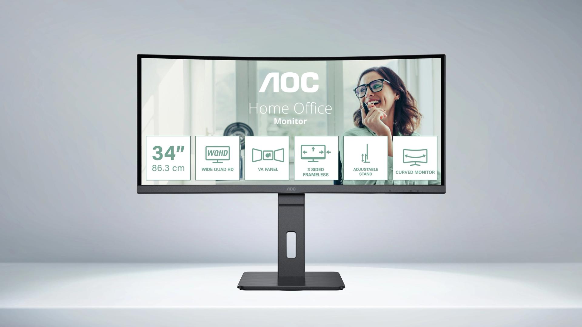 AOC CU34P3CV ultrawide zakrivljeni monitor na uredskom stolu s više otvorenih prozora, prikazujući produktivan radni prostor za multitasking, poslovne zadatke i multimediju.