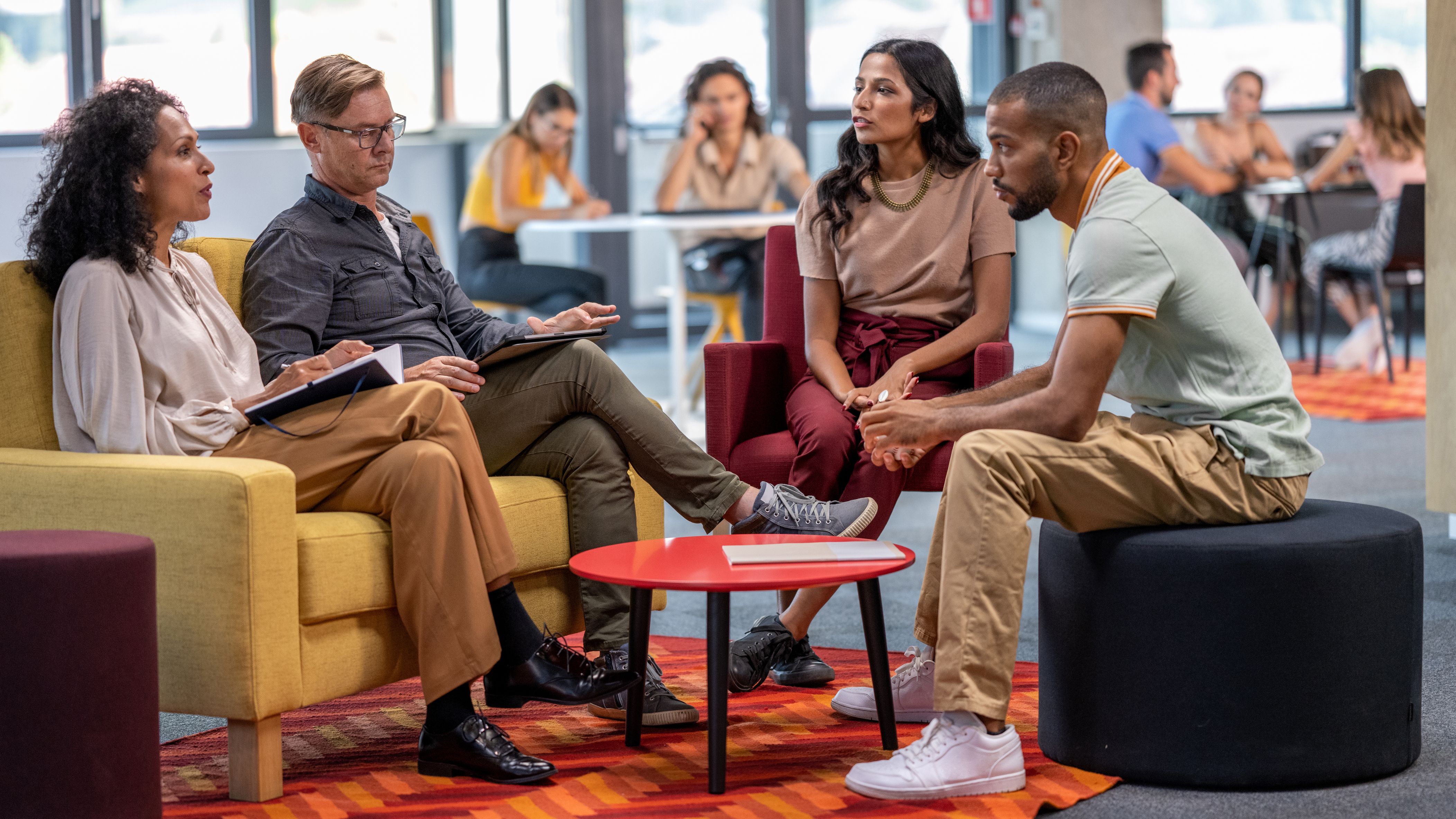 clean office carpet with employees working collaboratively
