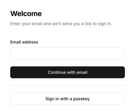 The sign-in page with an Email address field, a Continue with email button and a Sign in with a passkey button.