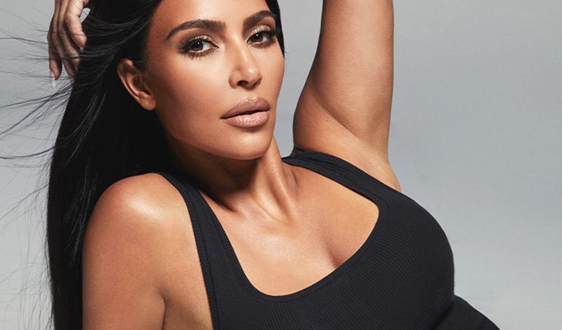 Kim Kardashian wears SKIMS in a styled campaign. 