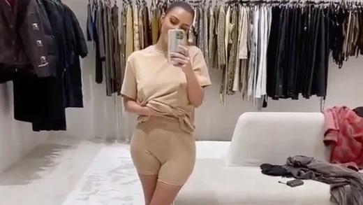 Kim Kardashian West in SKIMS Boyfriend Unisex Loungewear
