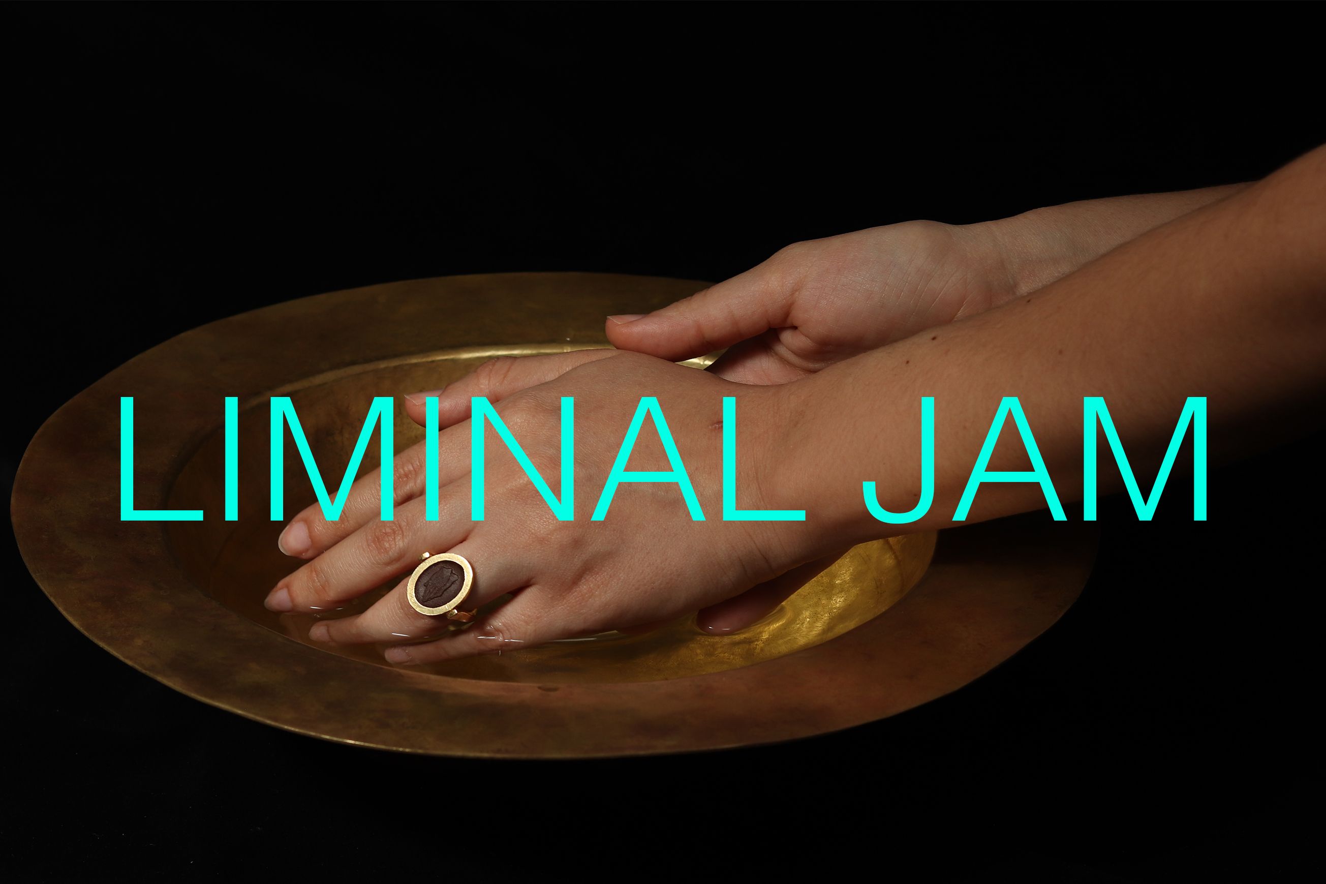Hands scooping liquid out of a gold dish
