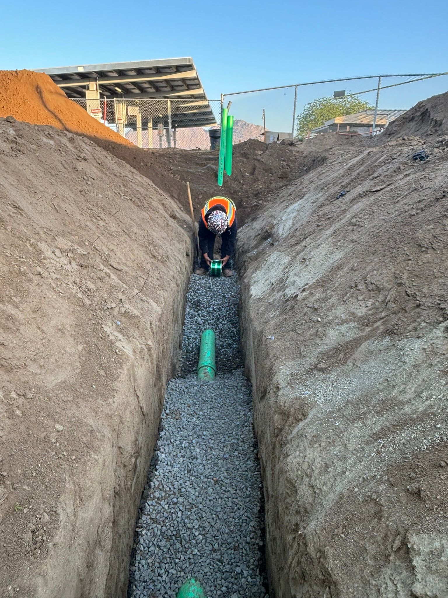 ground crew doing a pipe installation