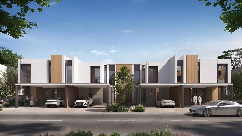 Oasis townhouse exterior with landscaped front garden at Haven By Aldar, Dubai