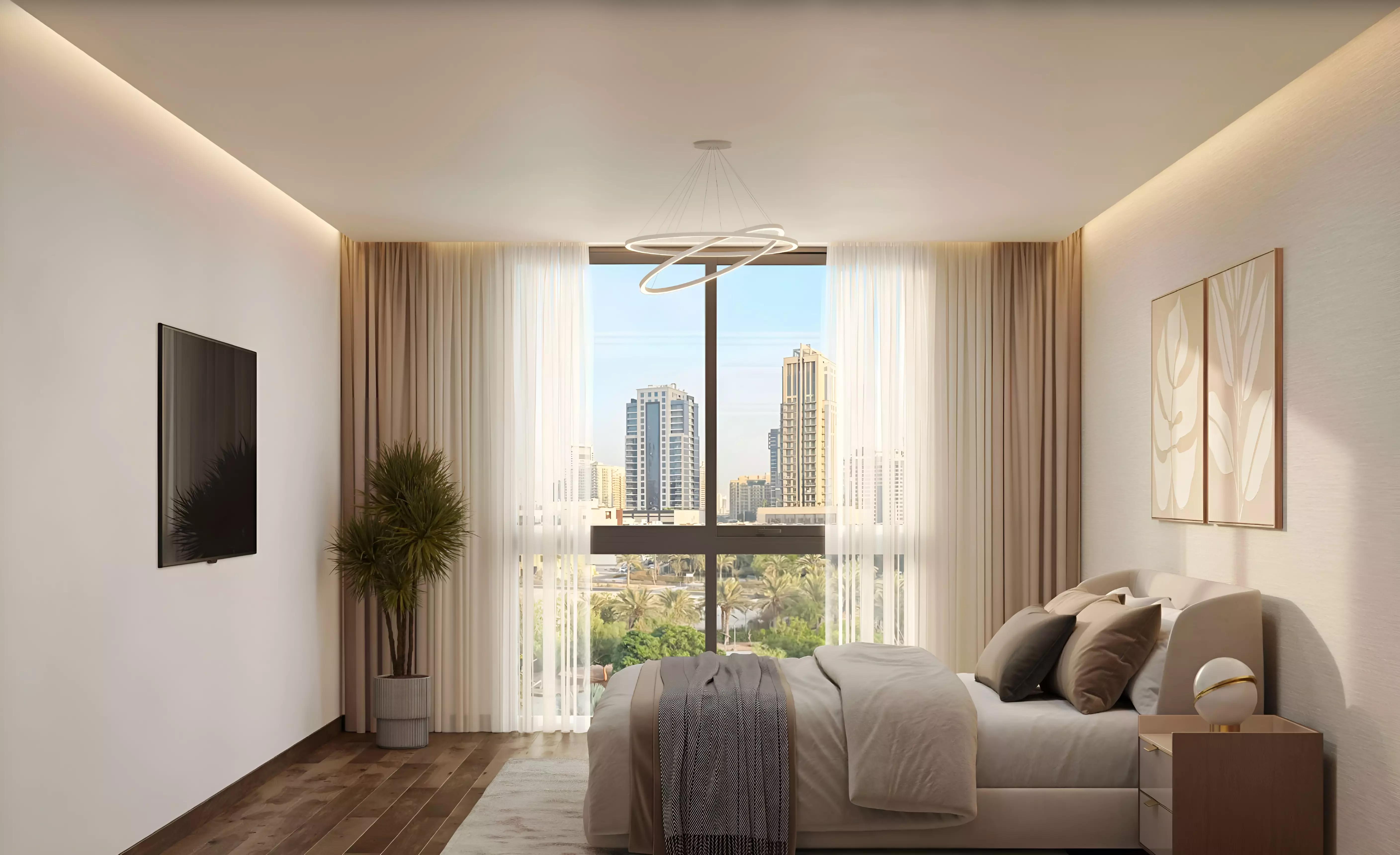 Carmel Residences amenity deck with landscaped greenery, JVC, Dubai