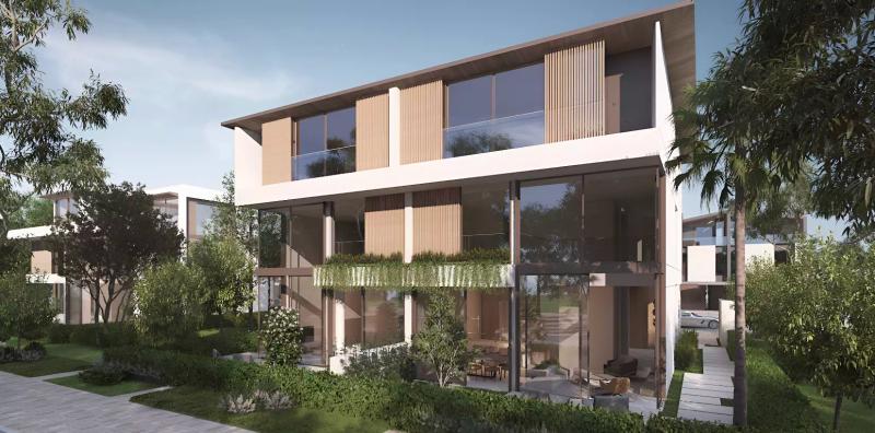 Nad Al Sheba Gardens Phase 3 townhouse exterior with landscaped front garden, Dubai