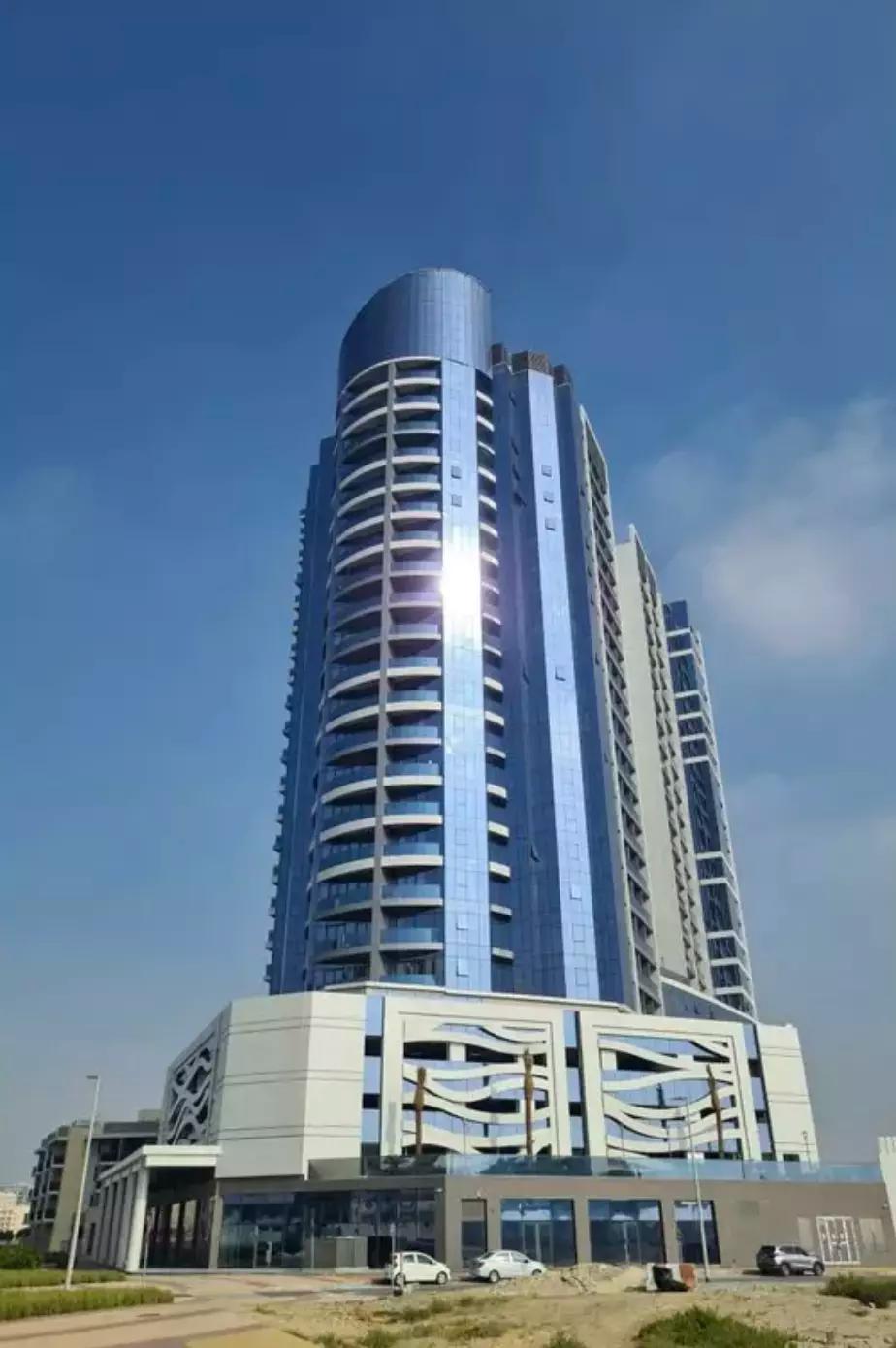 Blue Waves Tower apartment interior living area, Dubai Land Residence Complex