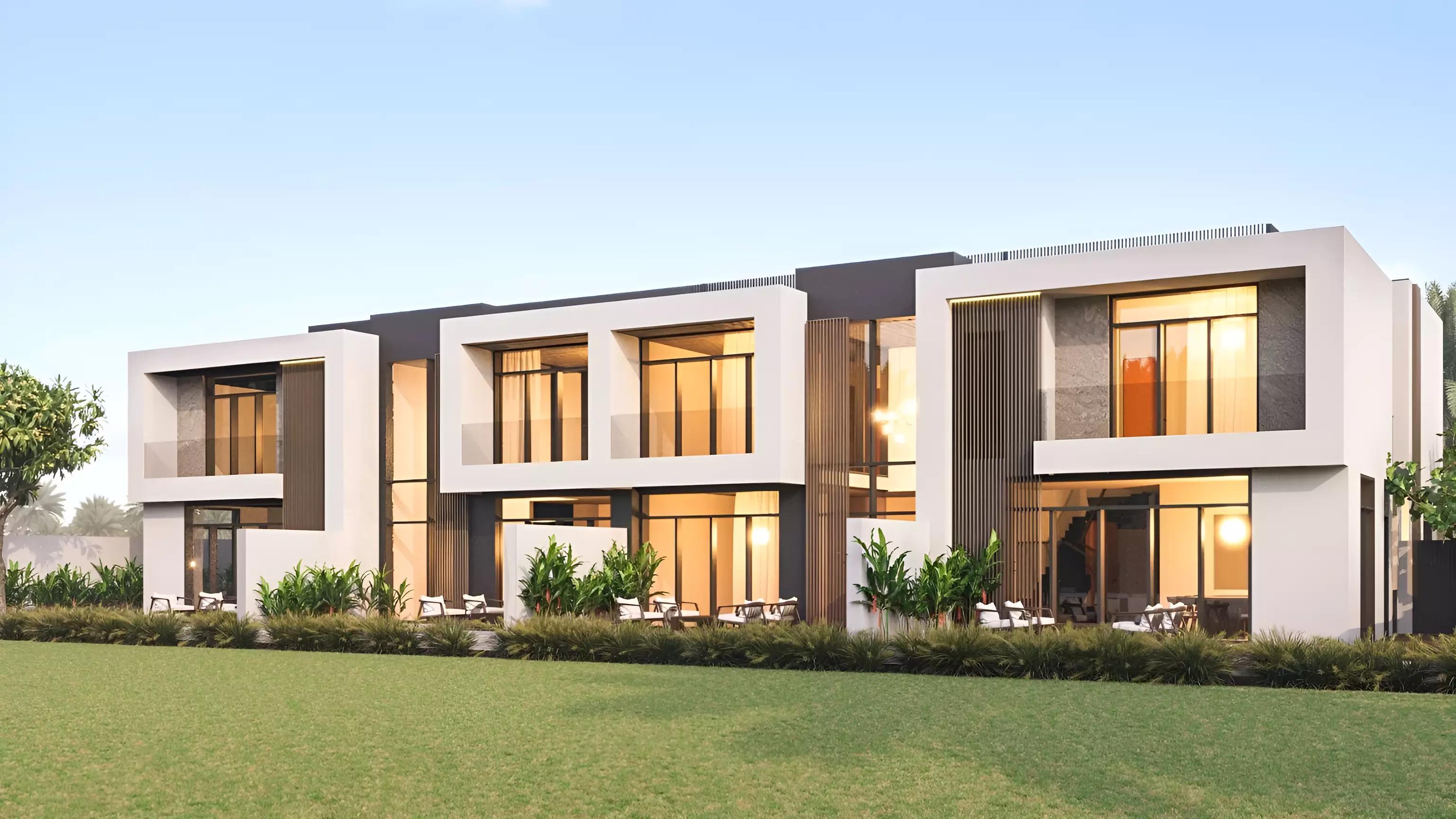 Bahria Town Dubai residential street view with townhouses and greenery