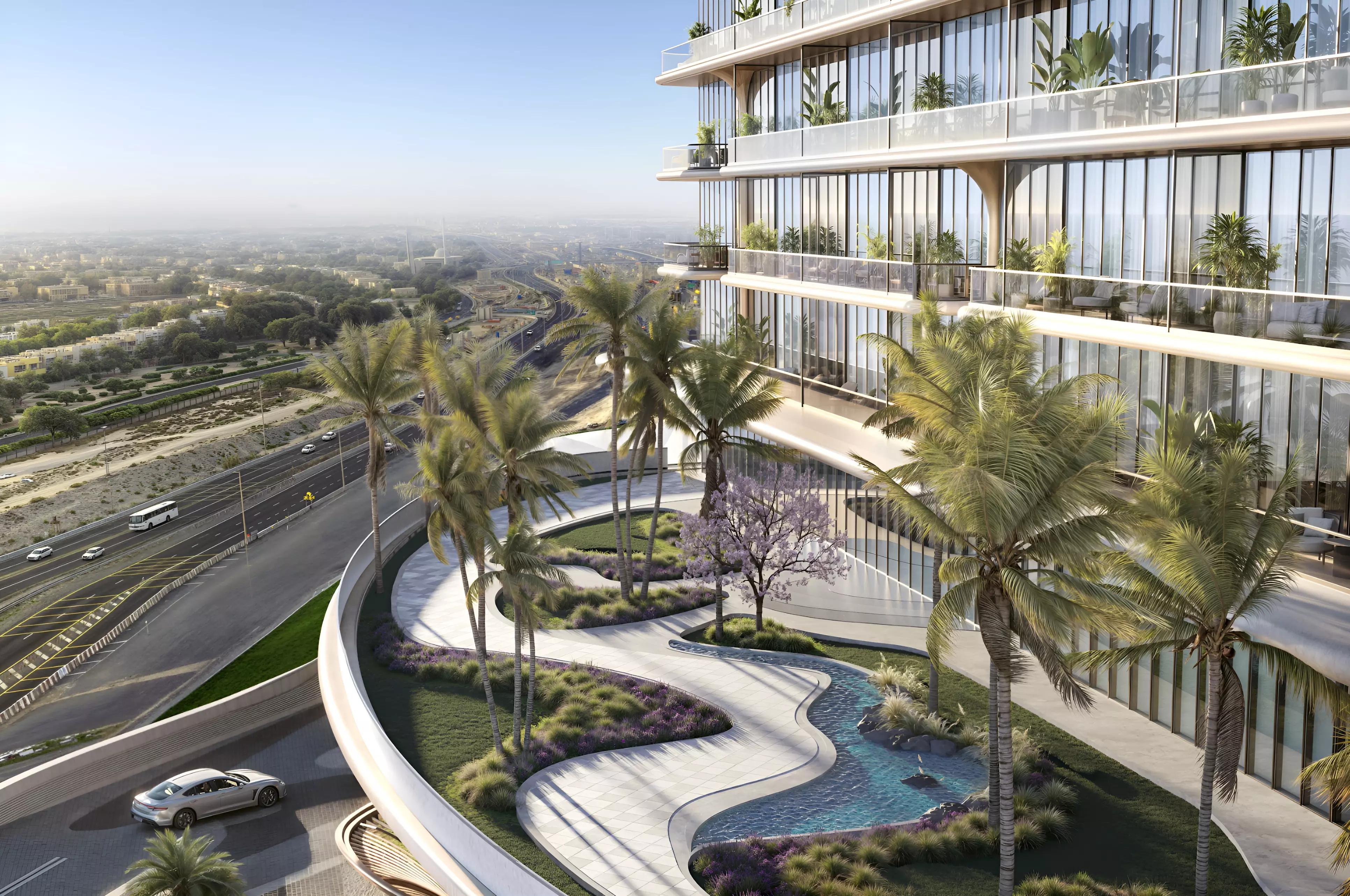 Velos Residence landscaped garden and outdoor seating area
