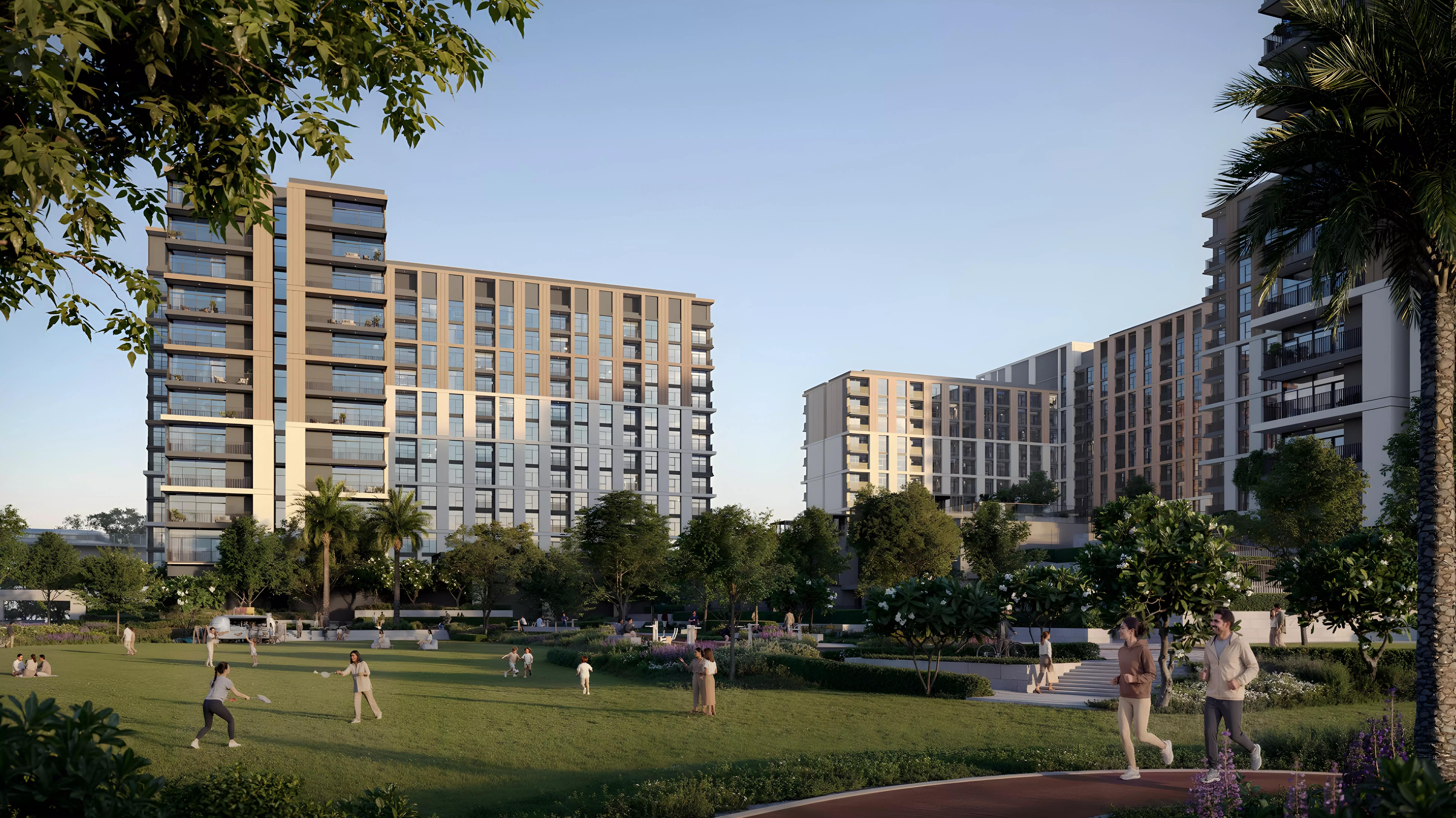 Terra Woods mid-rise apartment buildings with landscaped courtyard and residents walking, Expo City Dubai
