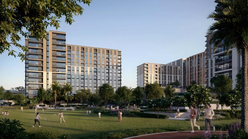 Terra Woods mid-rise apartment buildings with landscaped courtyard and residents walking, Expo City Dubai