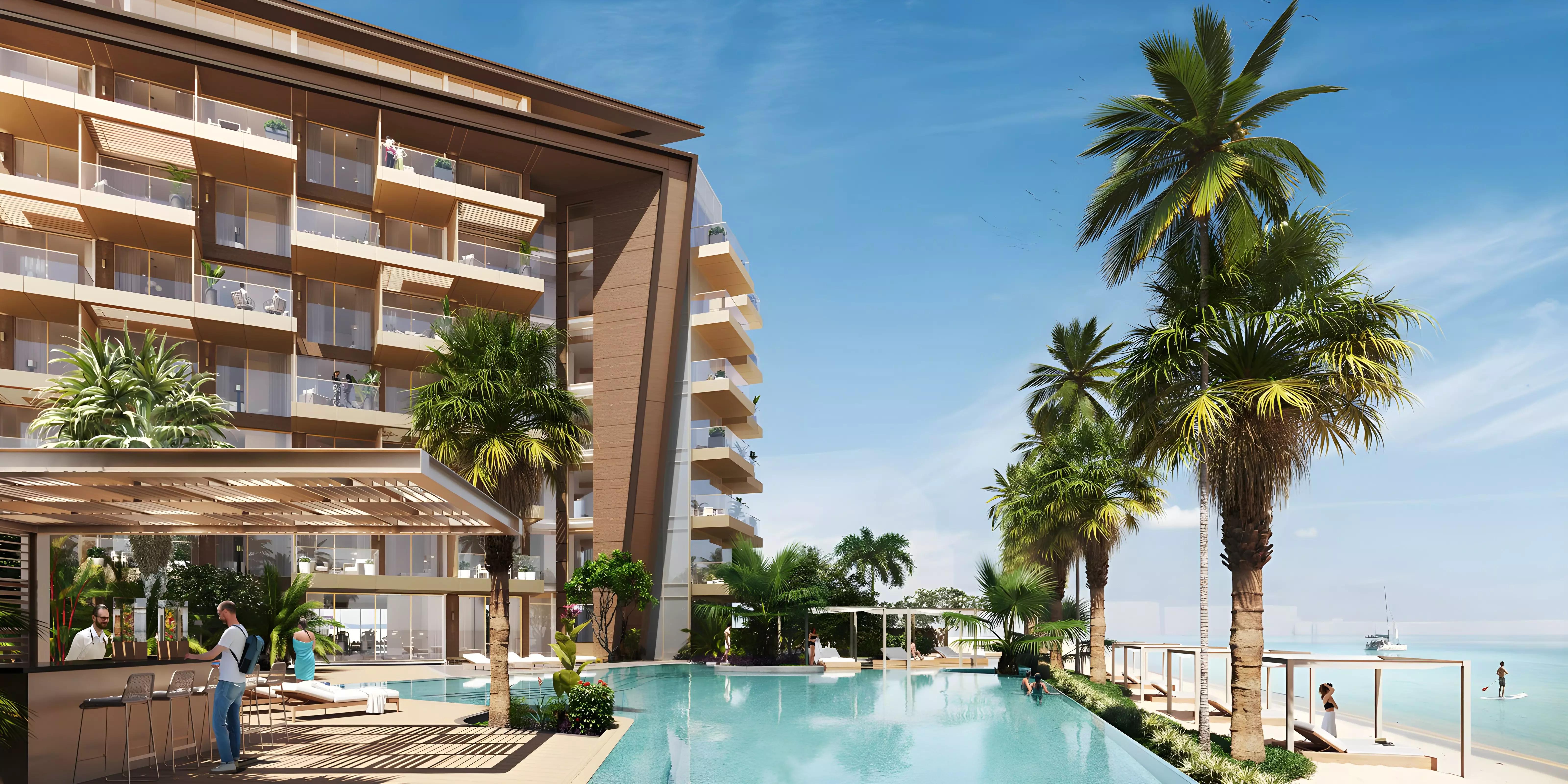 Ellington Beach House shared pool deck overlooking the Palm Jumeirah coastline