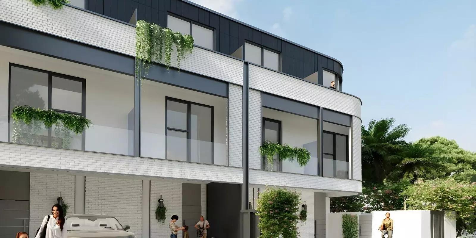 Taormina Village villa entrance with driveway and greenery, Majan, Dubai