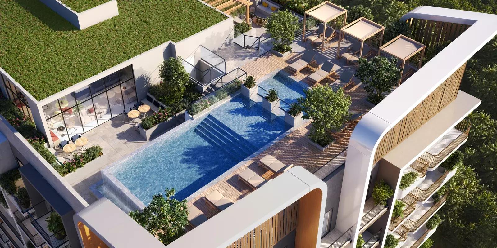Weybridge Gardens shared swimming pool deck, Dubai Land Residence Complex, Dubai