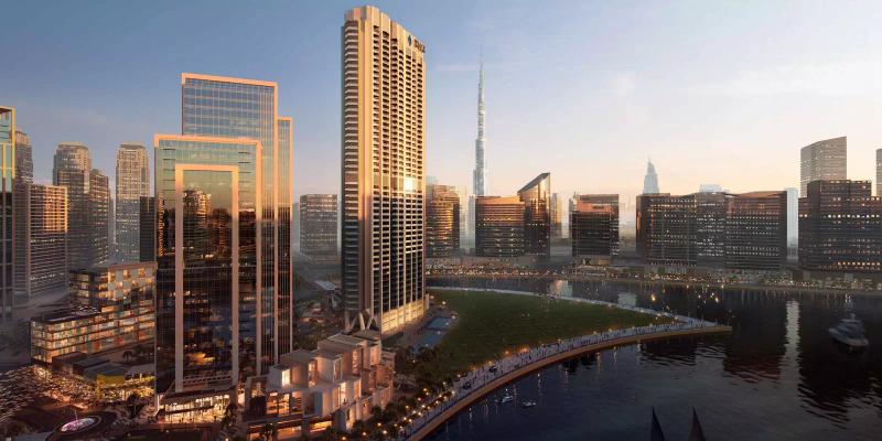Peninsula Phase 3 residential tower exterior on the Business Bay waterfront, Dubai